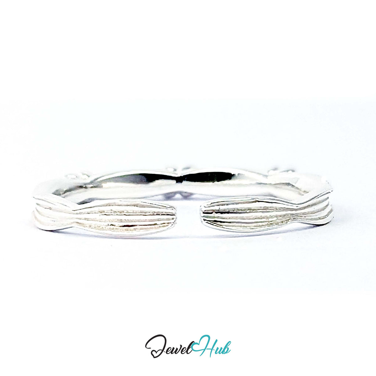 Flower Band Ring showing the open back of the ribbed 925 sterling silver band