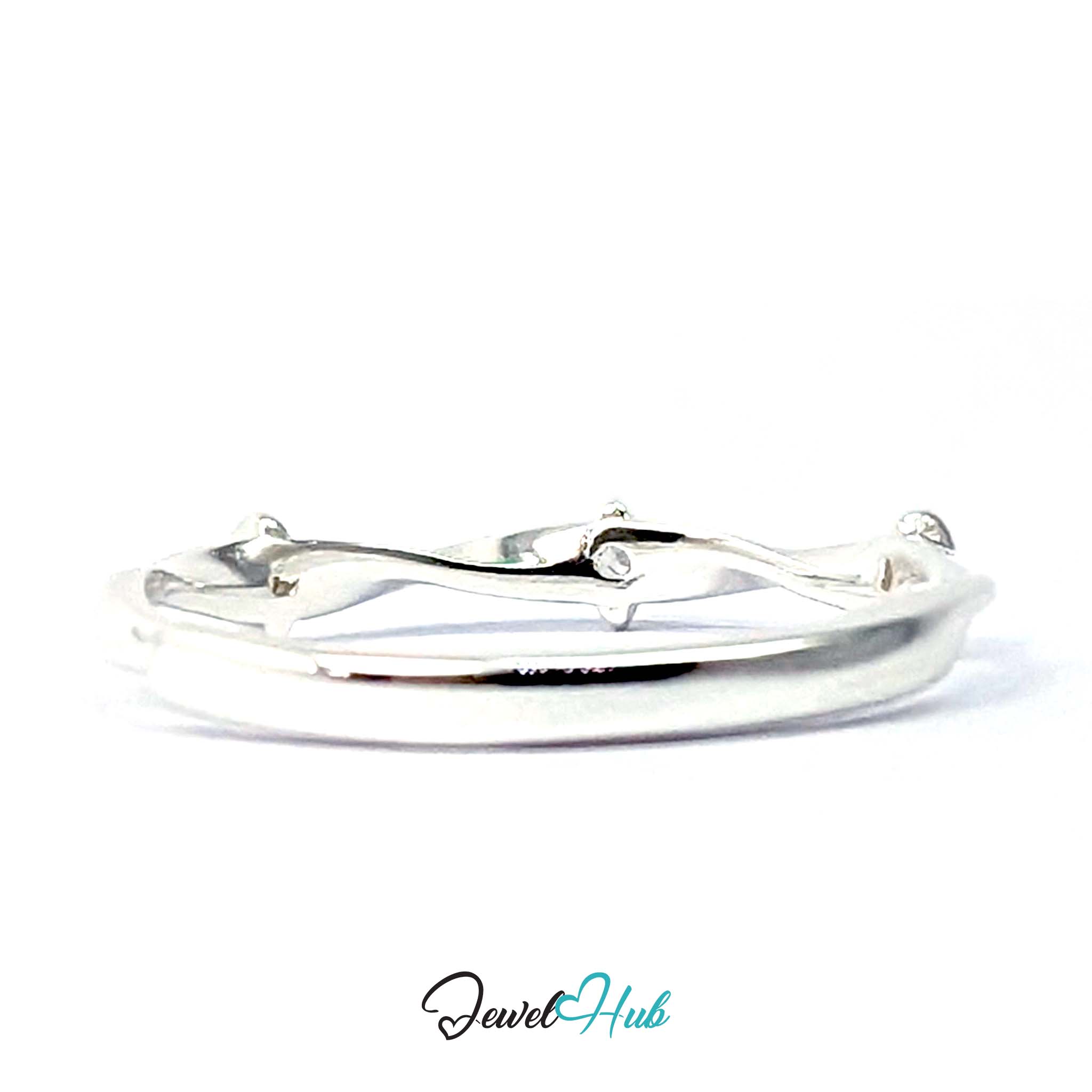 Side view of the Three Spark Ring in polished 999 fine silver