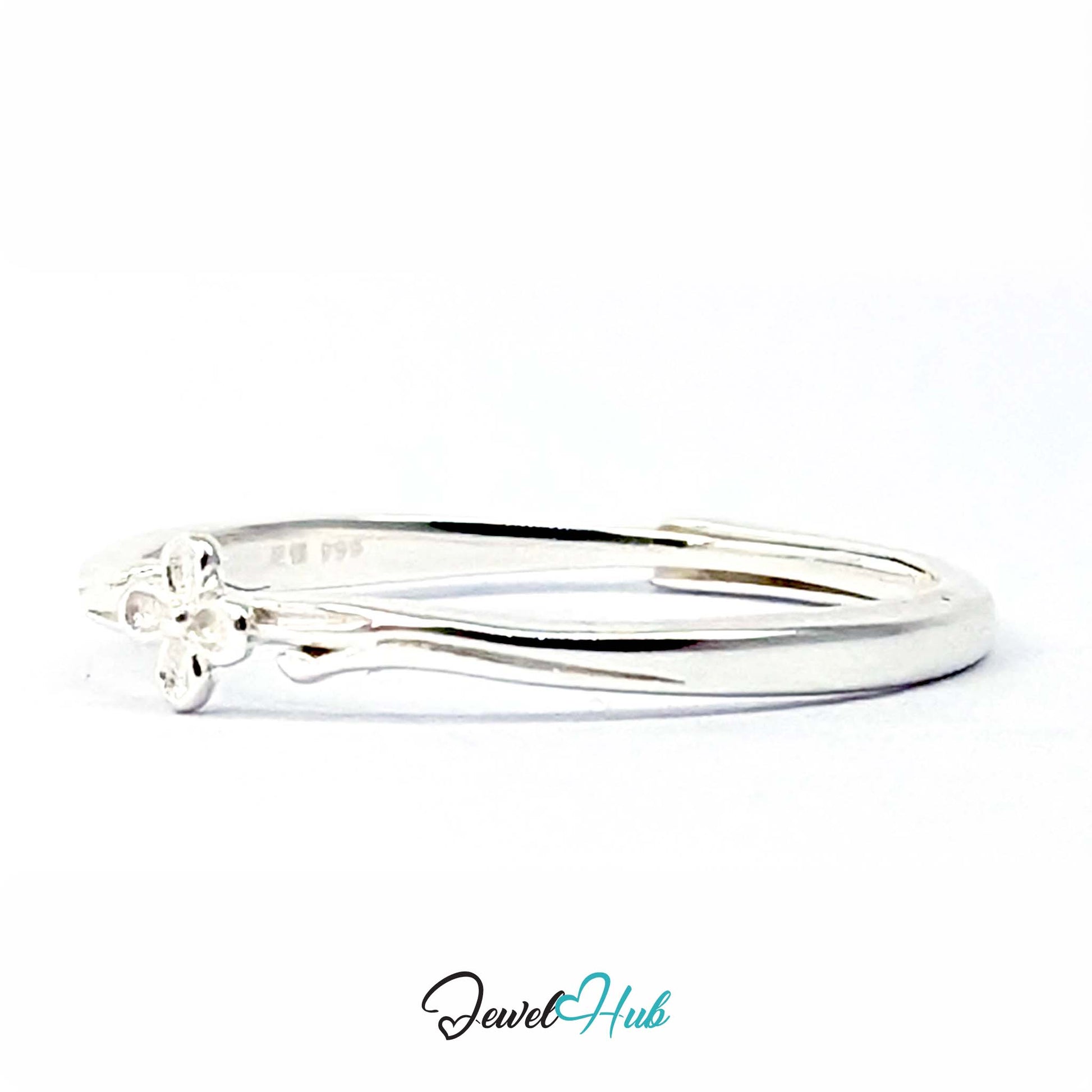 Single Flower Ring at an angle, showing the flower and the fine silver 999 stamp