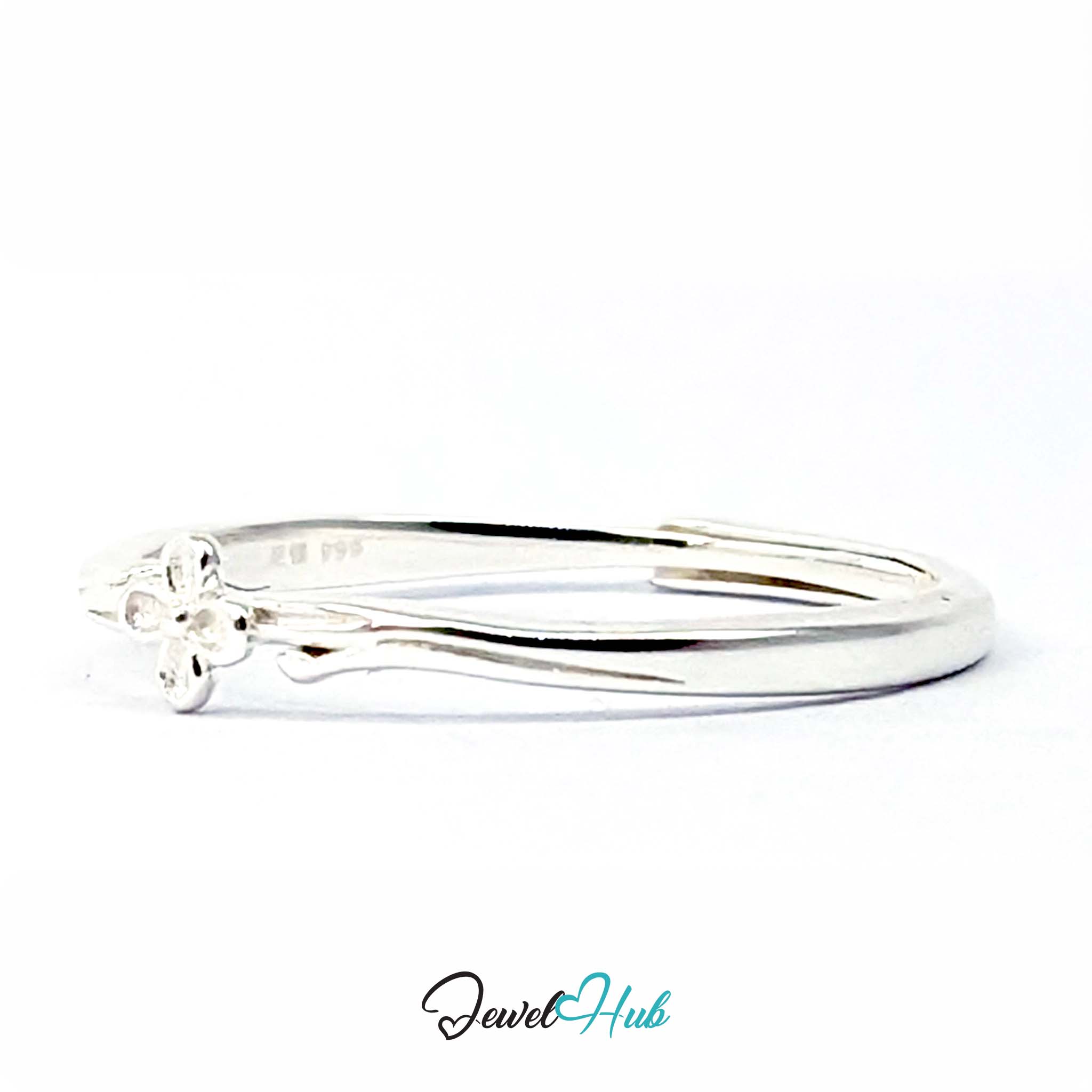 Single Flower Ring at an angle, showing the flower and the fine silver 999 stamp