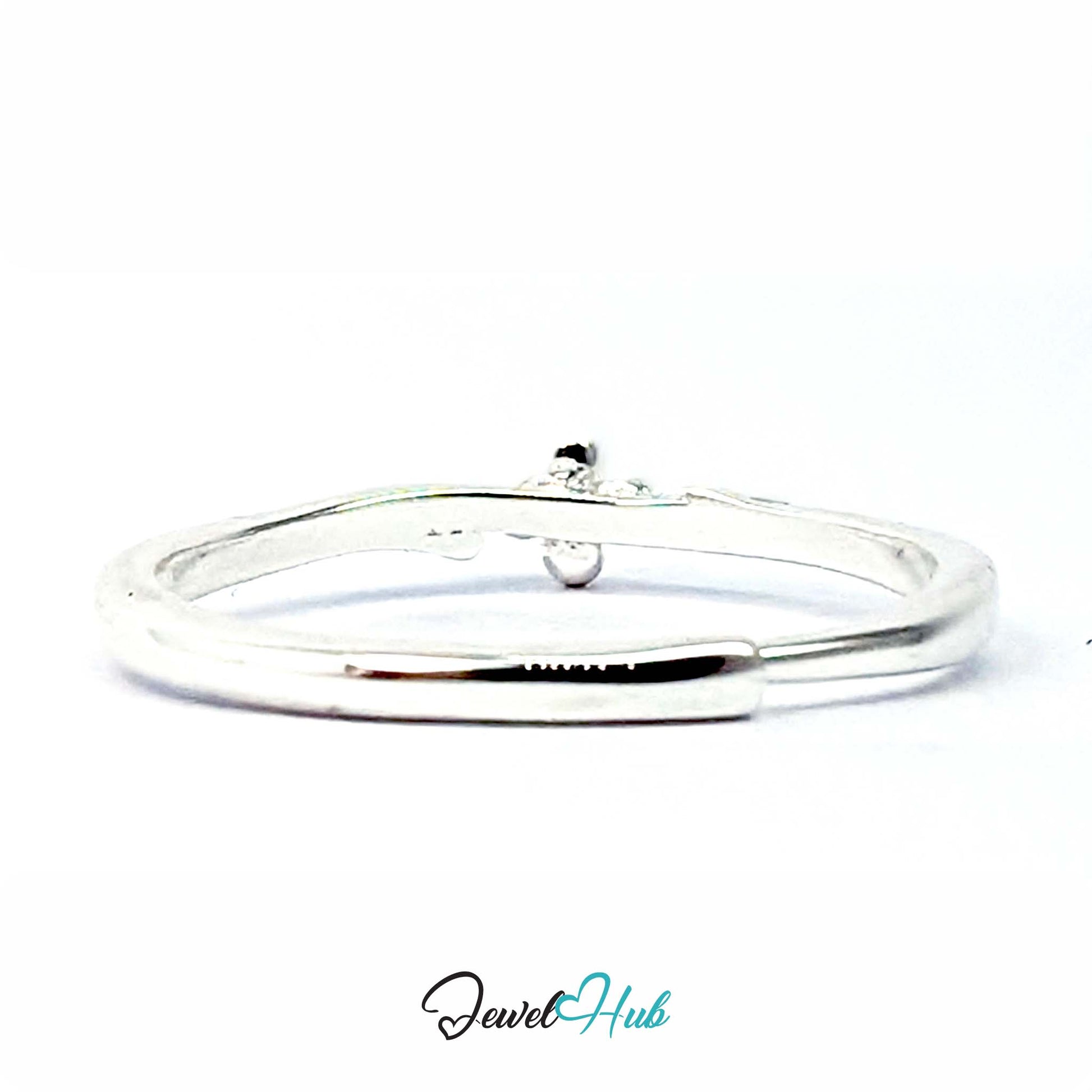 Side view of the Single Flower Ring, showing how slim the band sits