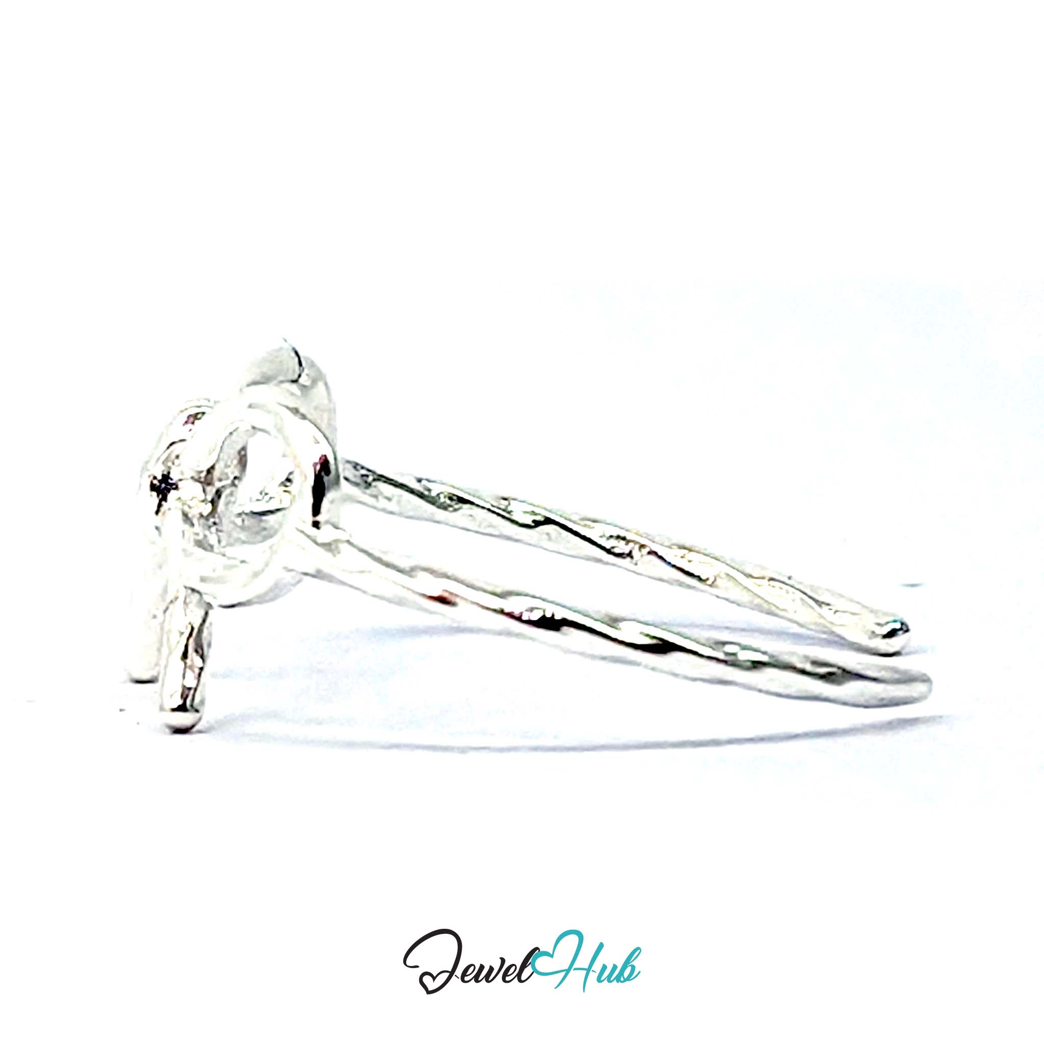 Bow Ring from the side, showing the tails running back into the band