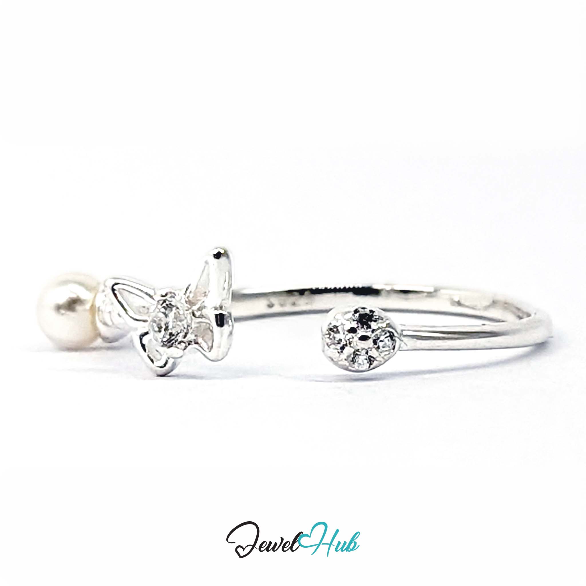 Faux pearl, crystal-set butterfly and single crystal spaced along an open 925 sterling silver band - JewelHub