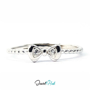 925 sterling silver bow ring with a clear crystal set in each loop - JewelHub
