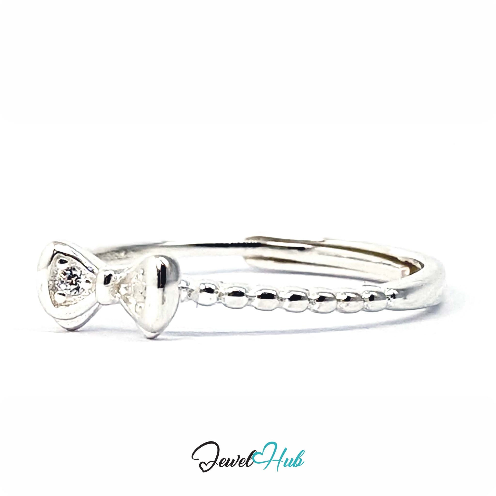 Solid silver bow with two prong-set crystals, on a beaded 925 sterling silver band - JewelHub