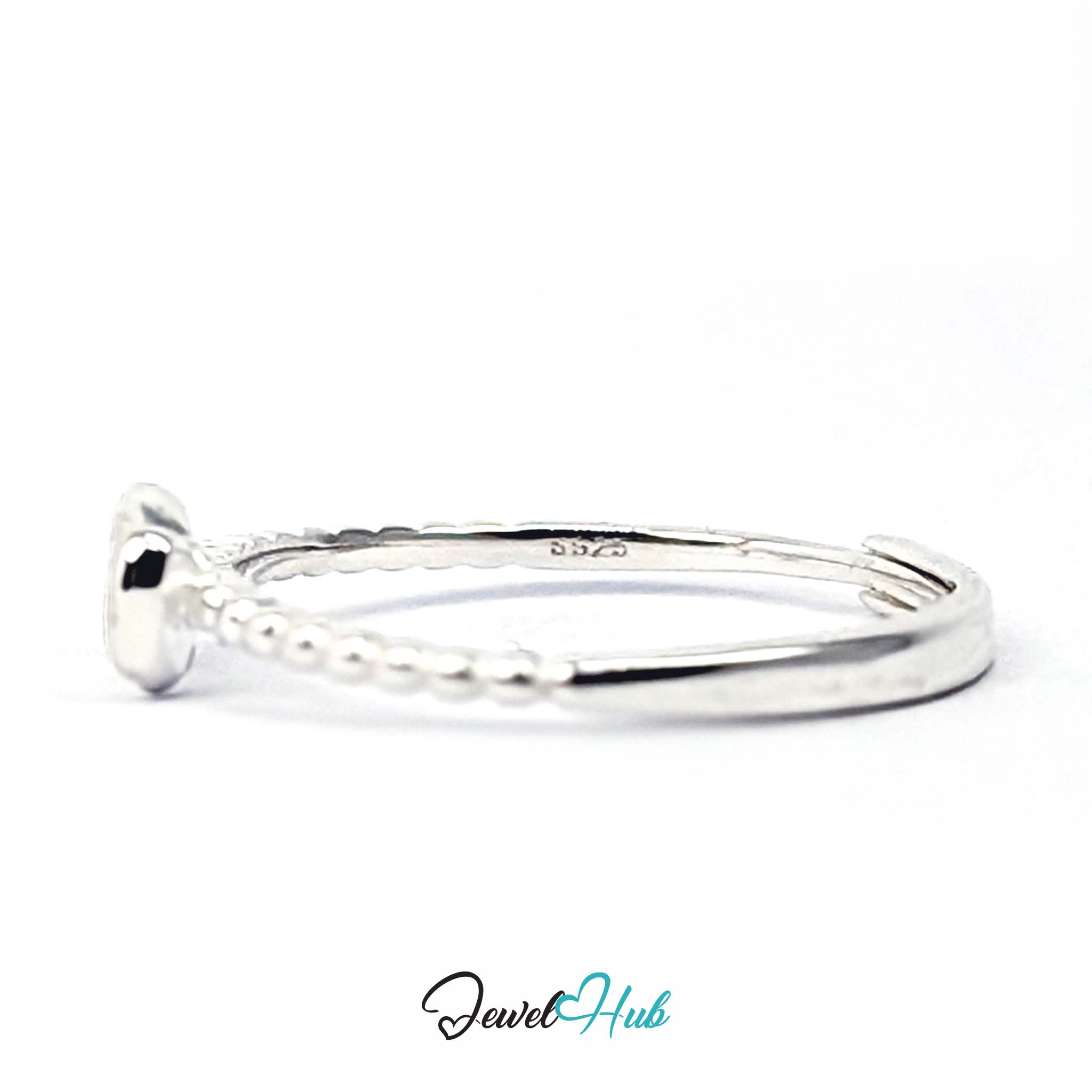 Open back of the bow ring with the S925 stamp visible inside the band - JewelHub