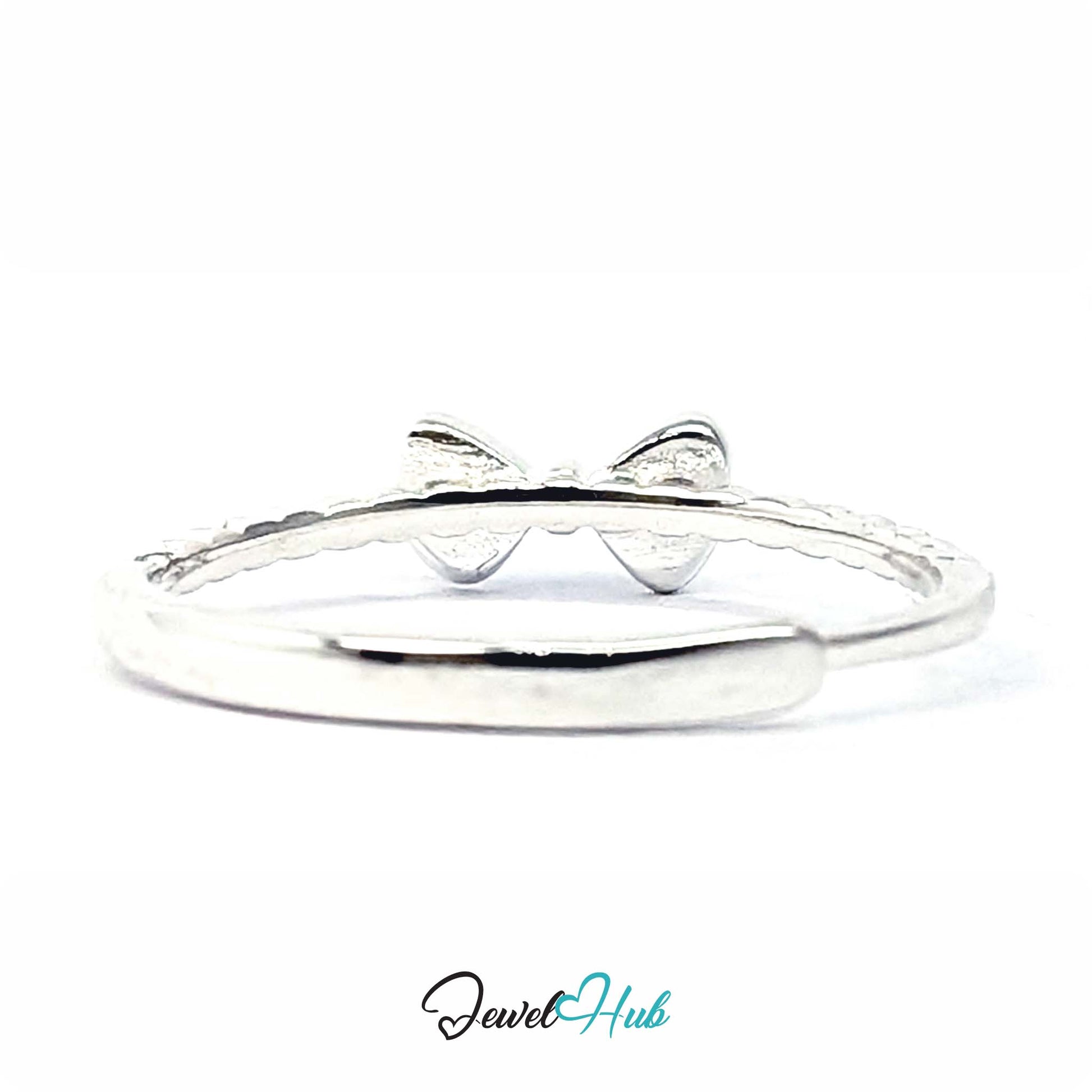 Bow ring from above, showing the rounded loops and the beaded shoulder - JewelHub