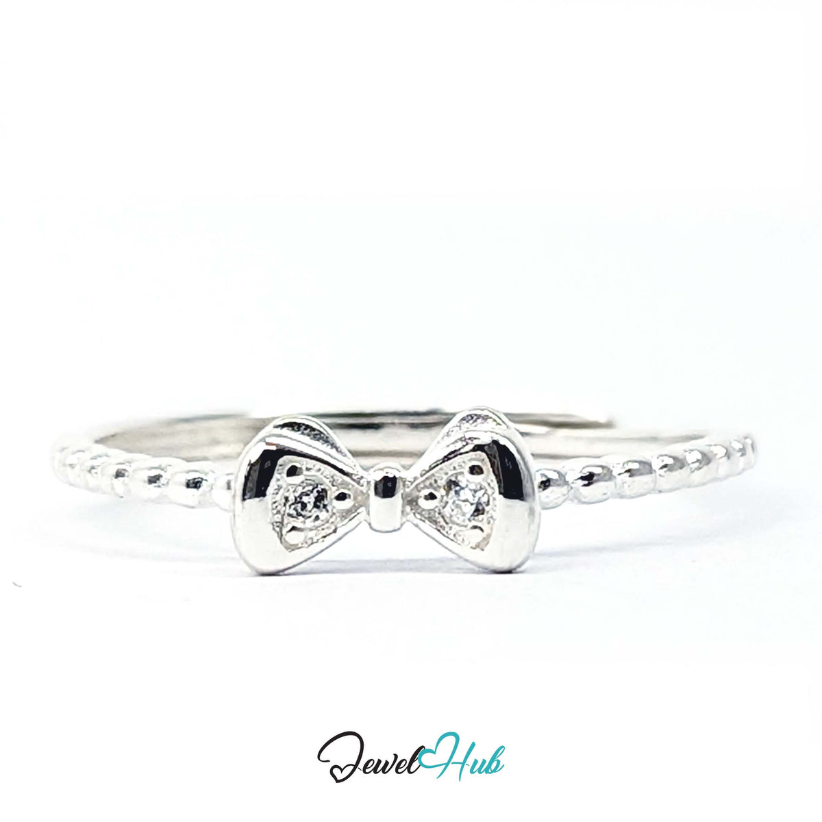 Three-quarter view of the 925 sterling silver bow ring and its two crystals - JewelHub