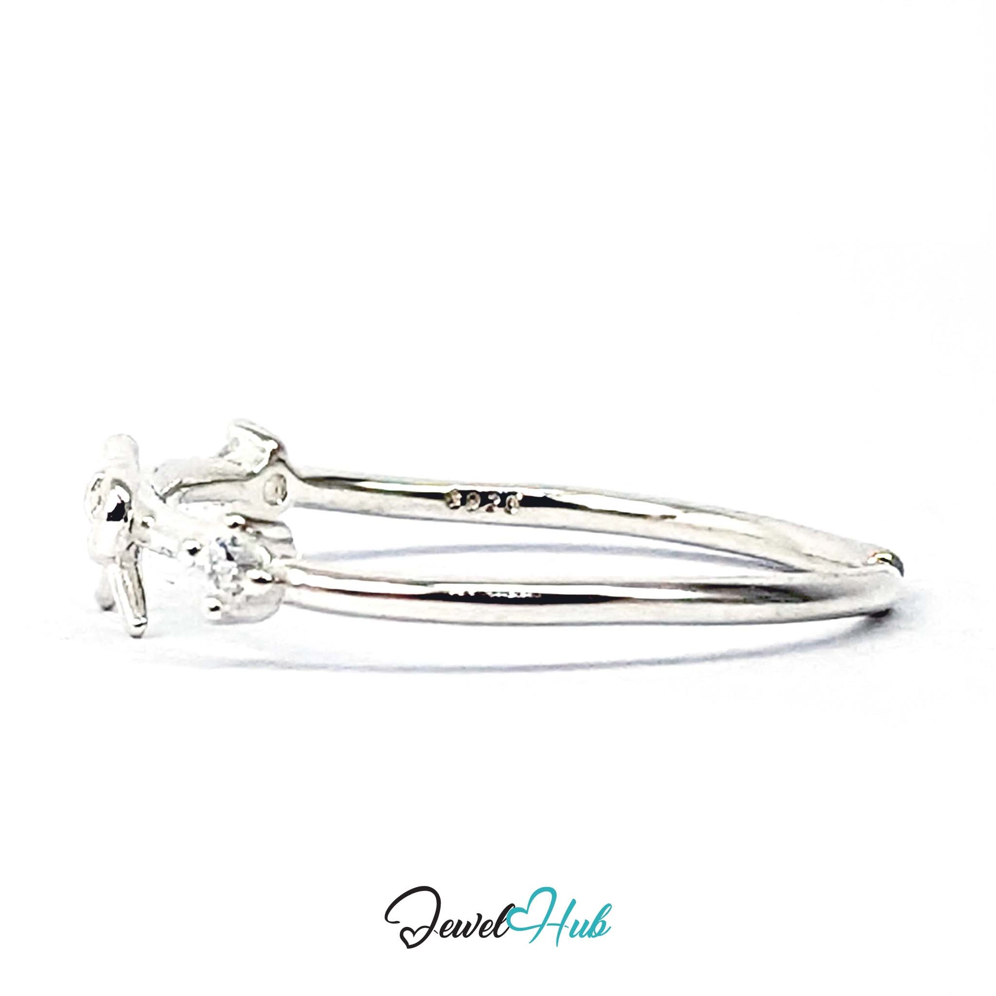 Open back of the outline bow ring with the S925 stamp inside the band - JewelHub