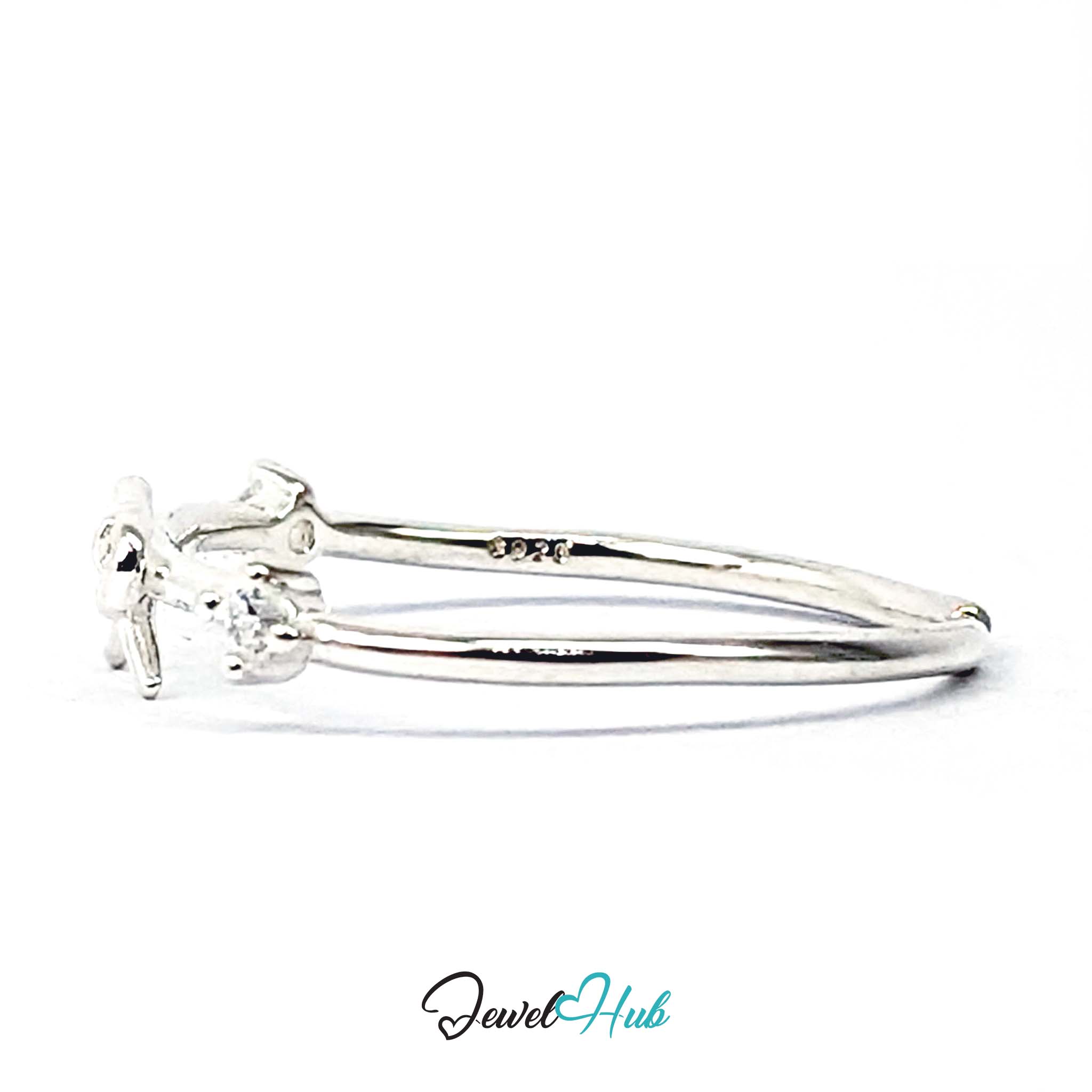 Open back of the outline bow ring with the S925 stamp inside the band - JewelHub