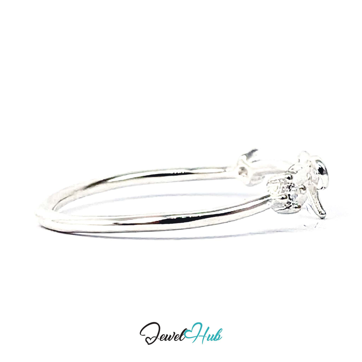 Side view of the open bow ring, showing the slim profile of the 0.64g band - JewelHub