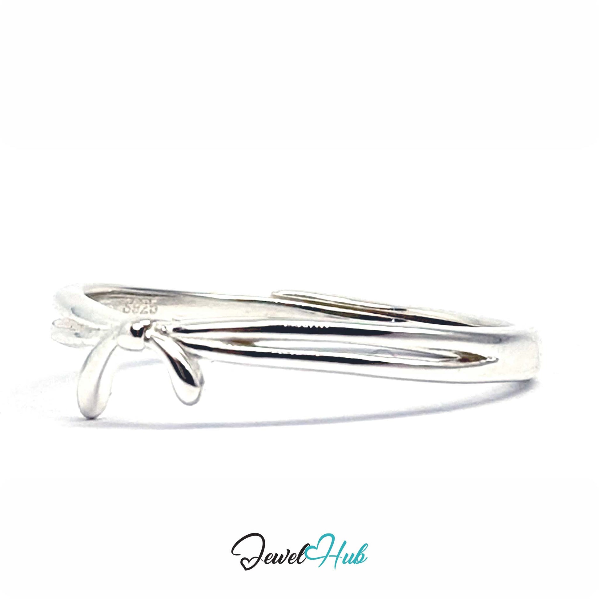 Ribbon ring with two tails falling at the front of a polished silver band - JewelHub