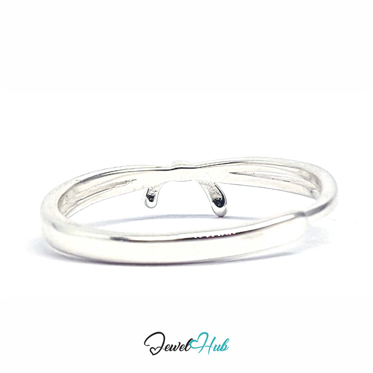 Ribbon ring from above, showing the long open loops running along the band - JewelHub
