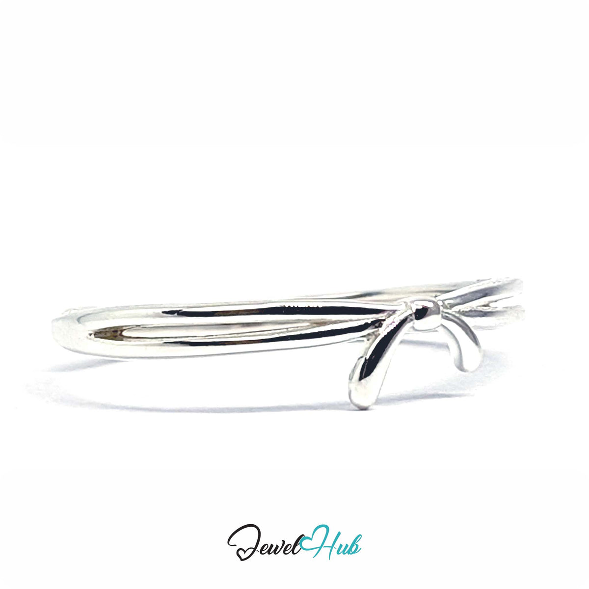 Ribbon ring at an angle, with the stretched loops catching the light - JewelHub