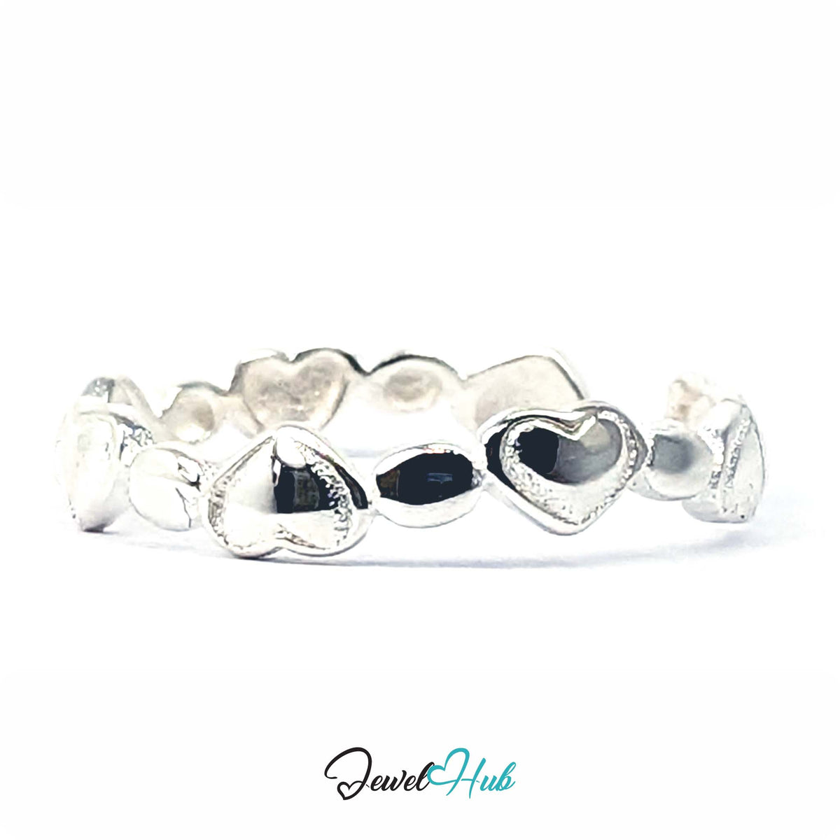 Heart band ring rotated to show more of the hearts continuing round the band - JewelHub