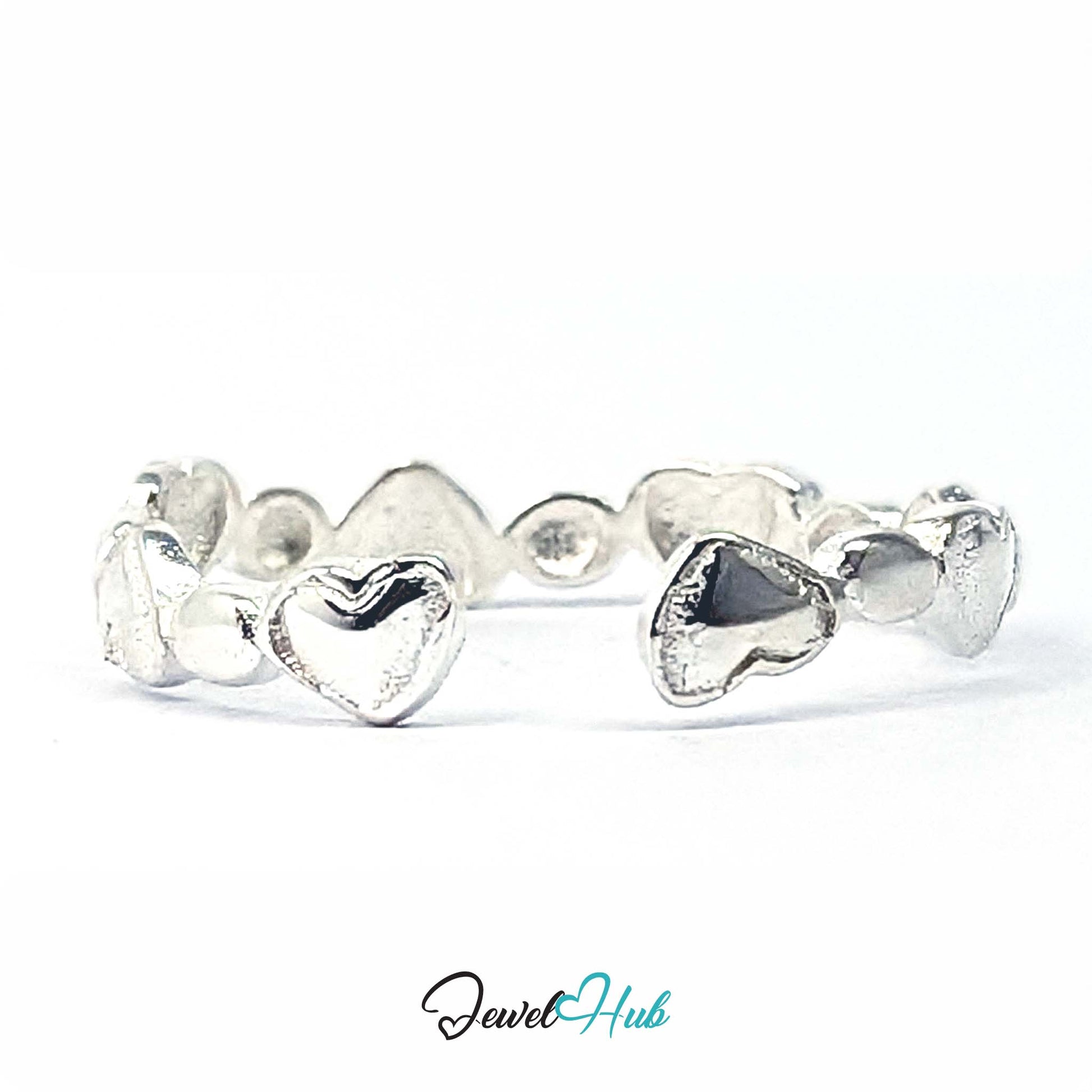 Side view of the heart band ring, showing the 3mm depth of the hearts - JewelHub