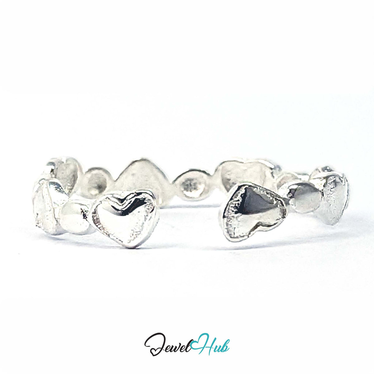Side view of the heart band ring, showing the 3mm depth of the hearts - JewelHub