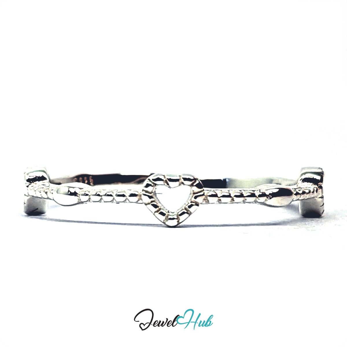 Three-quarter view of the three hearts ring in 925 sterling silver - JewelHub