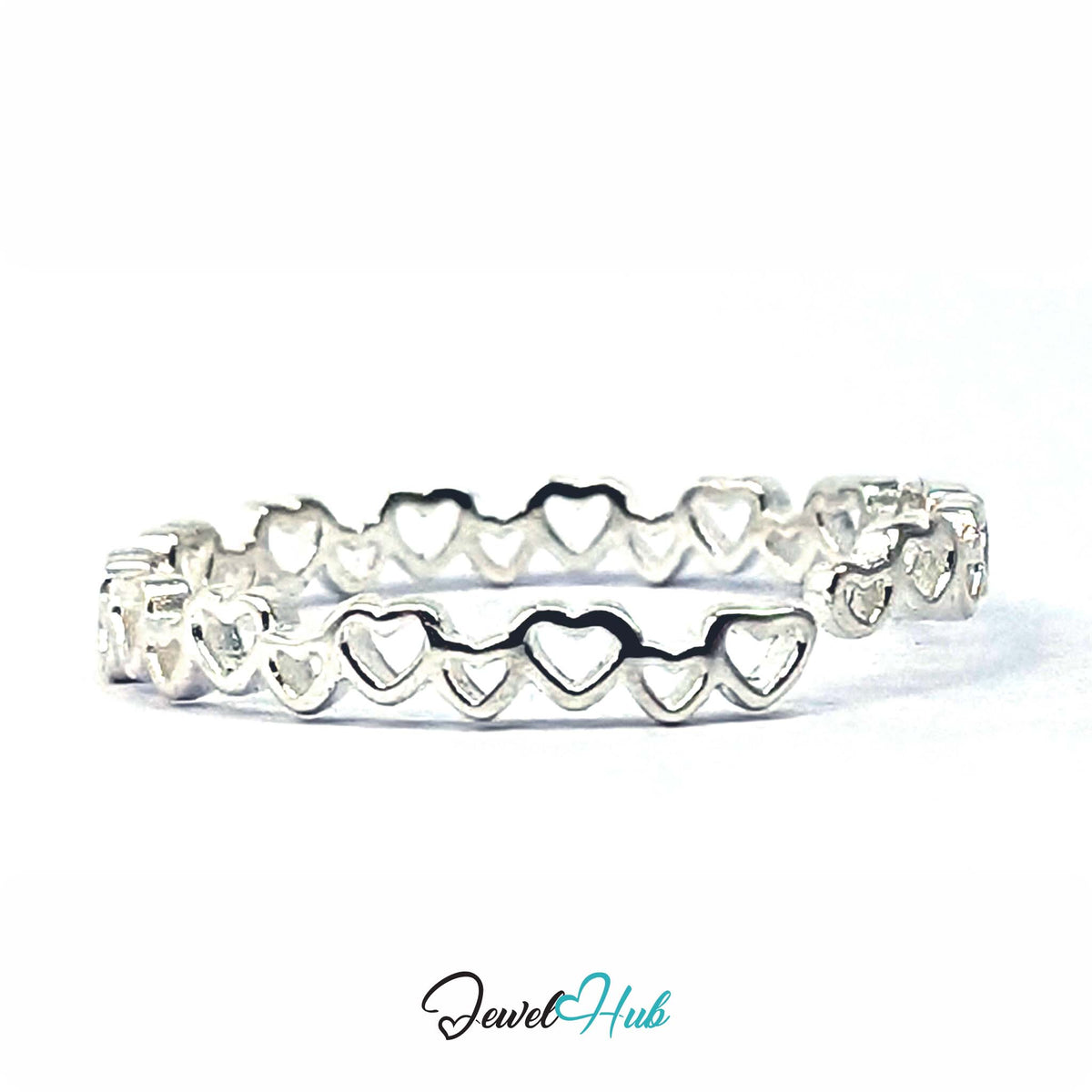 Linked hearts band from above, showing the hollow centre of each heart - JewelHub