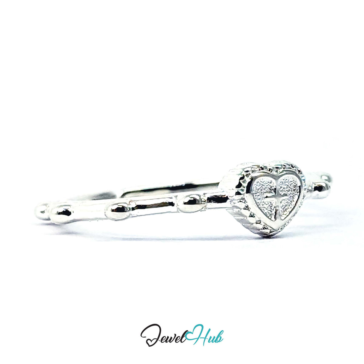 Cross heart ring at an angle, with the beaded band in the foreground - JewelHub