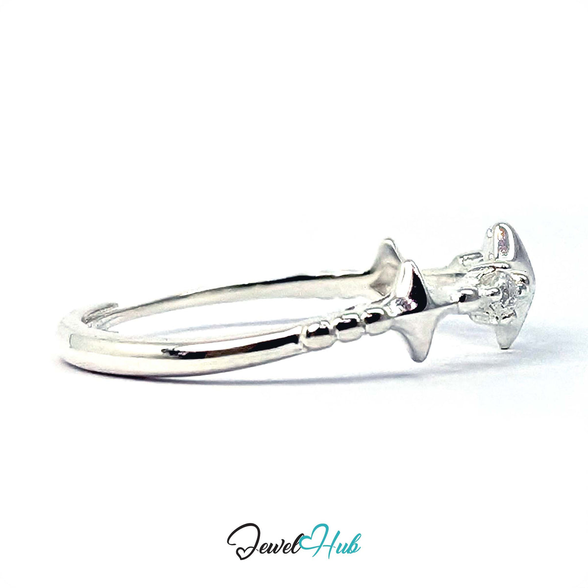 Side view of the 999 fine silver sparkle ring and its prong-set crystals - JewelHub