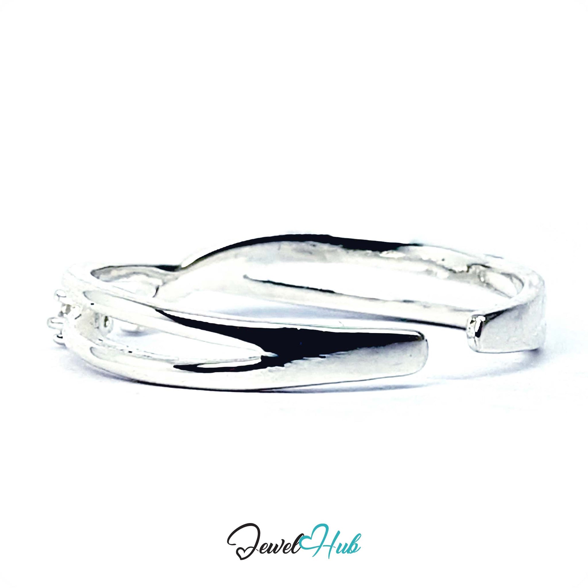 Overlap wave ring rotated to show the two bands separating behind the crossover - JewelHub