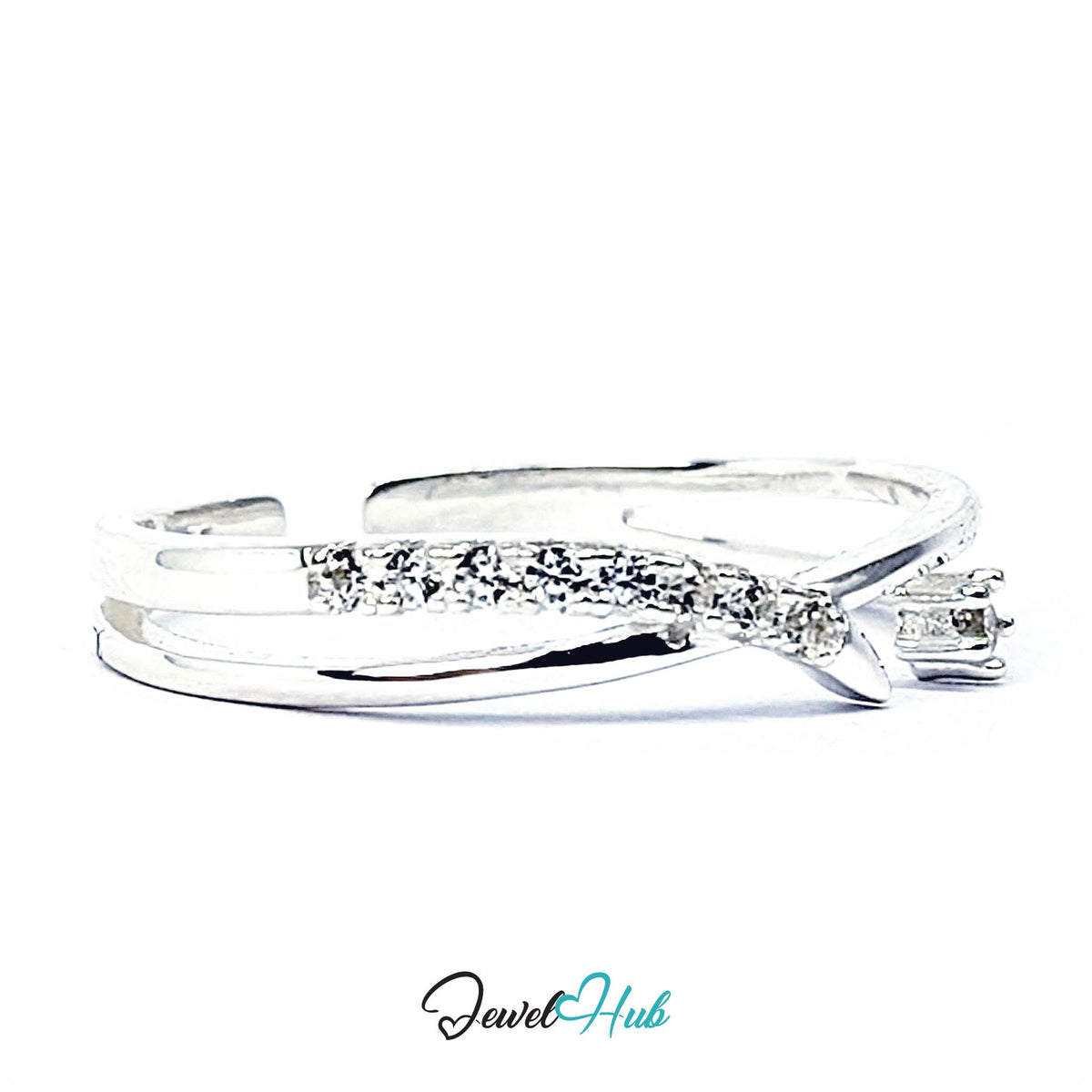 Overlap wave ring at an angle, with the larger prong-set crystal in view - JewelHub