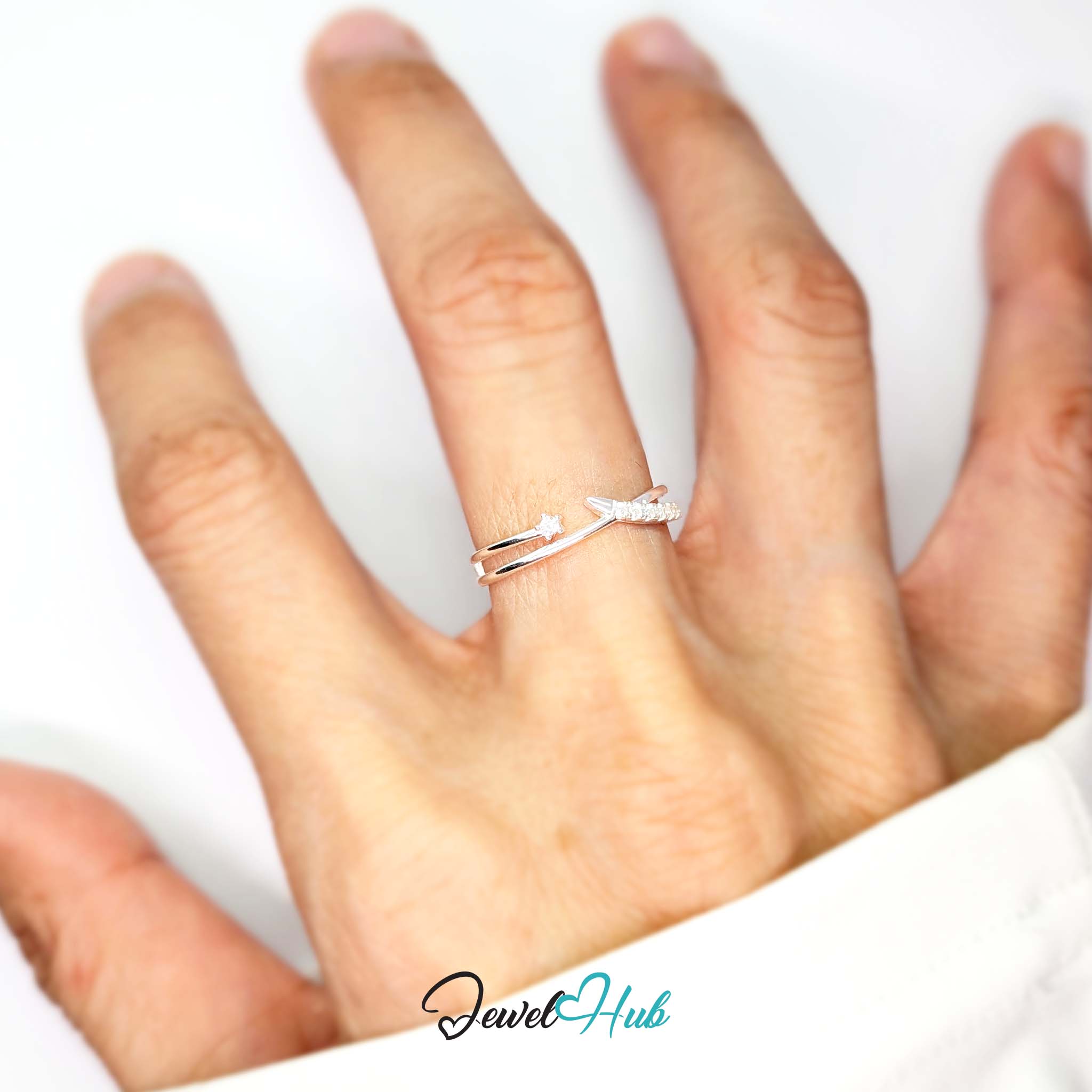 Overlap wave ring worn on a hand, showing the fit of the adjustable M-O band - JewelHub