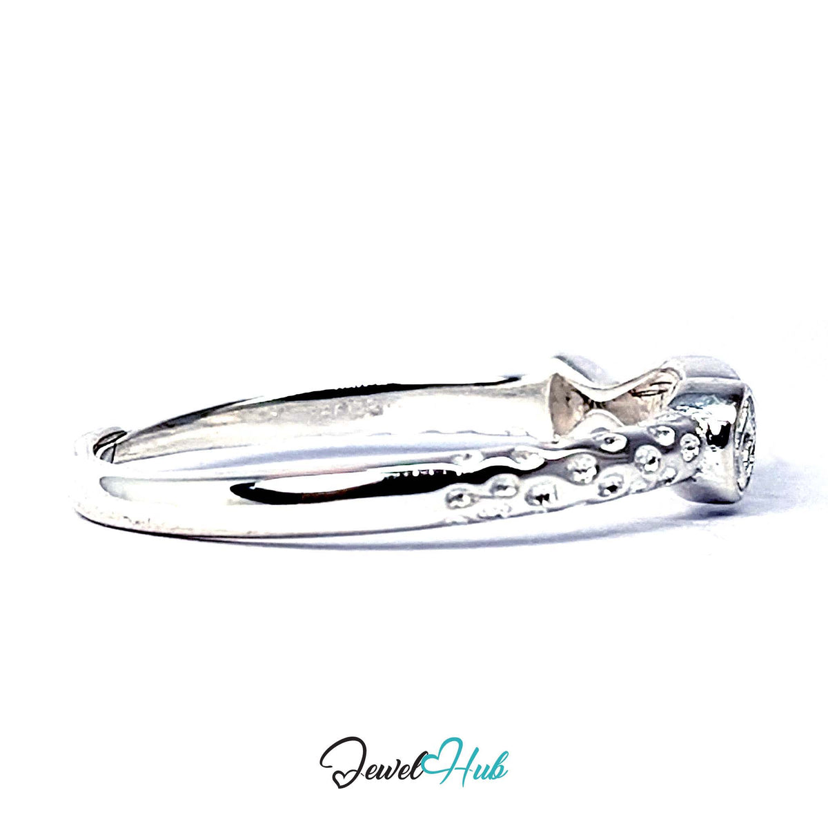Rear view of the ring, showing the beaded texture running along the shank - JewelHub