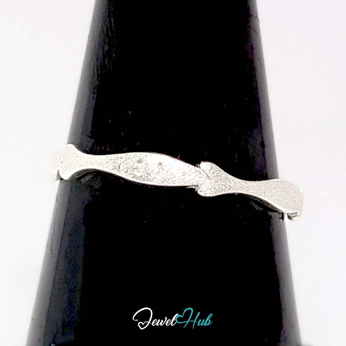 Five fish ring on a black cone display, showing the alternating textures - JewelHub