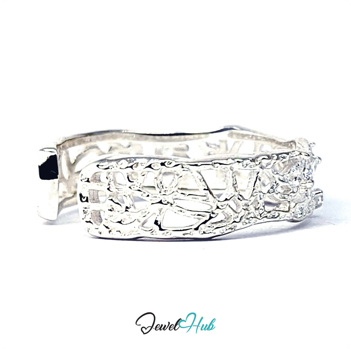 Angled view of the irregular openwork pattern running round the ring - JewelHub