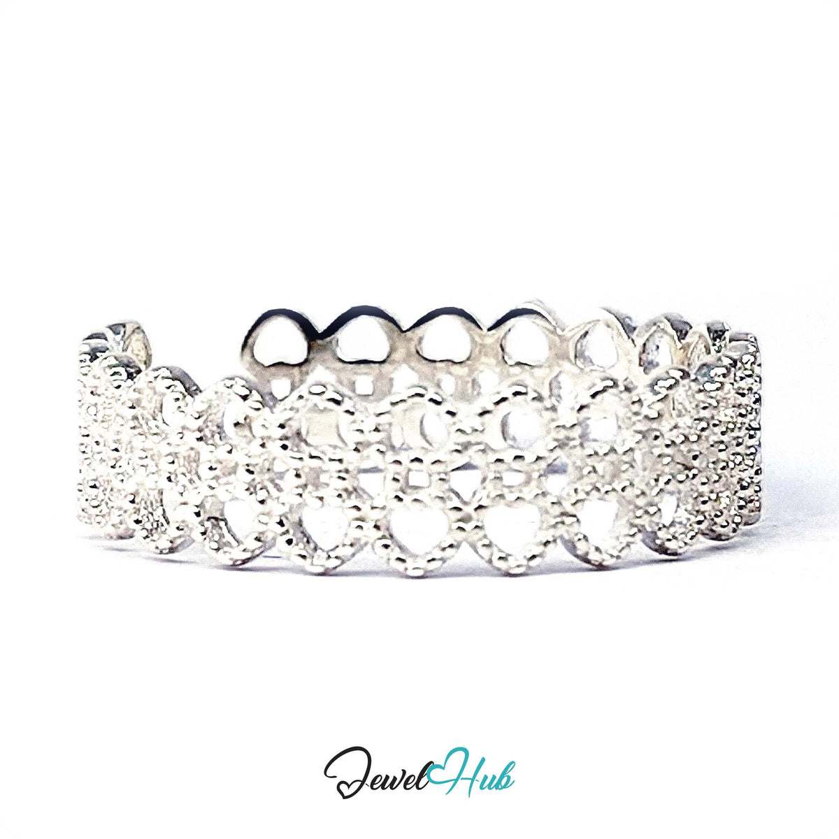 Angled view of the scalloped edge and pierced lace pattern - JewelHub