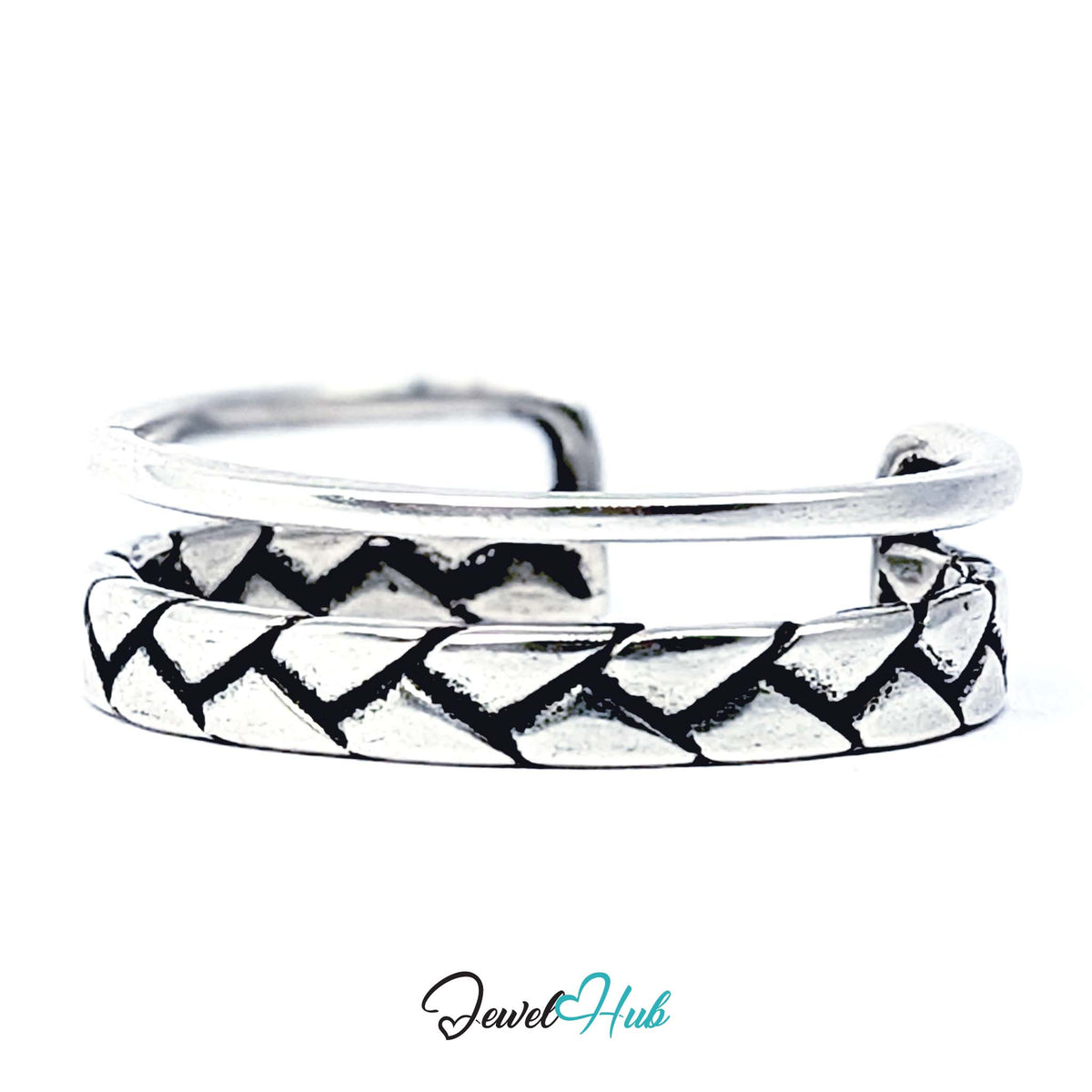 Side view of the plaited band with oxidised recesses and a plain wire above - JewelHub