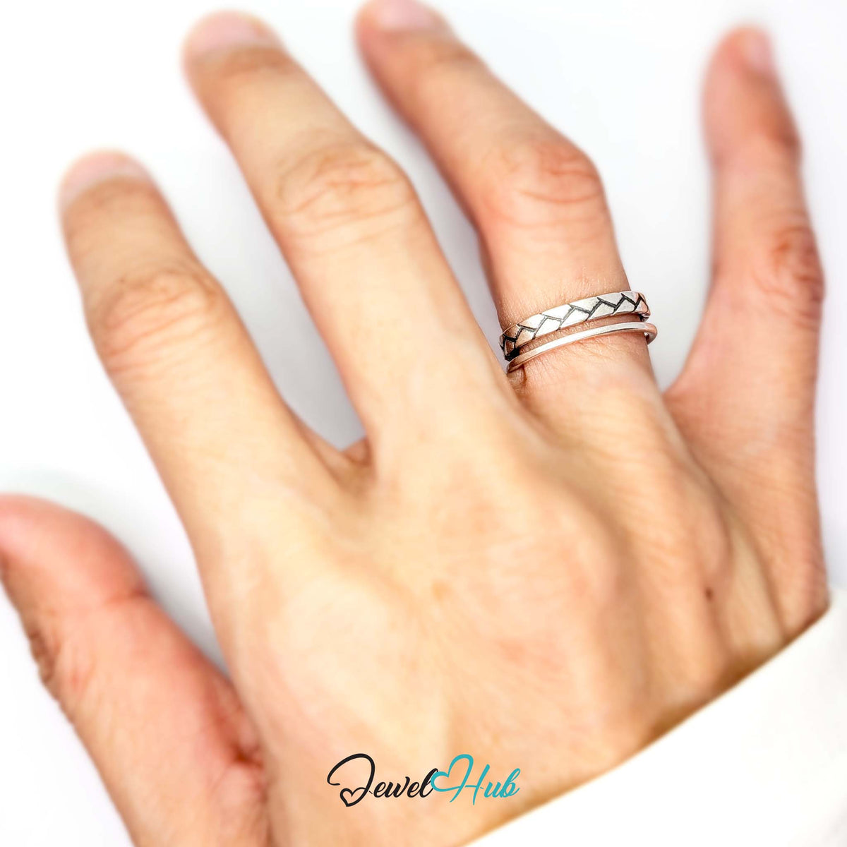 Double band ring worn on a hand, showing the small J-L fit - JewelHub