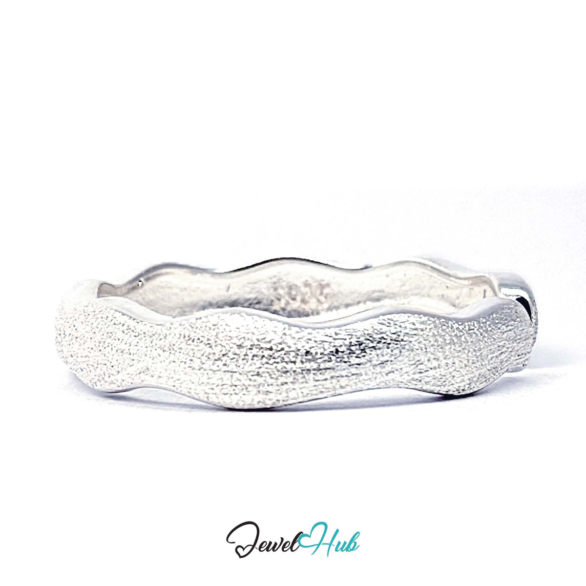 Wave edge band at an angle, showing the frosted surface texture - JewelHub