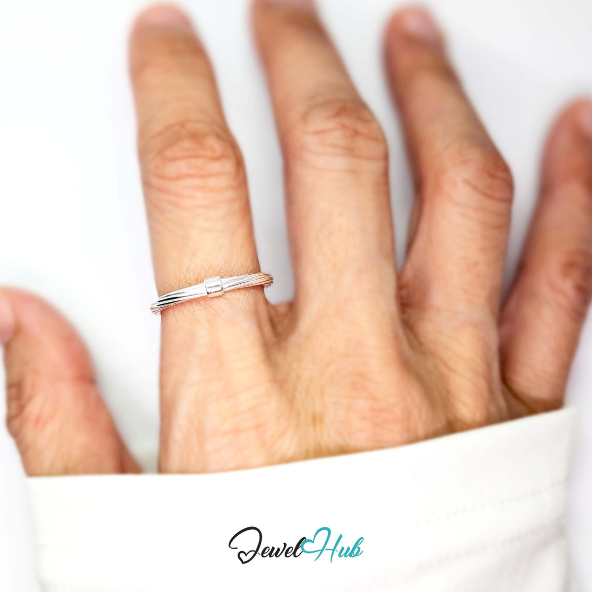 Rope strand ring worn on a hand, showing the slim N-P fit - JewelHub
