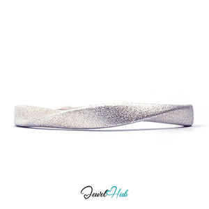 999 fine silver Mobius twist ring with a frosted matte finish - JewelHub