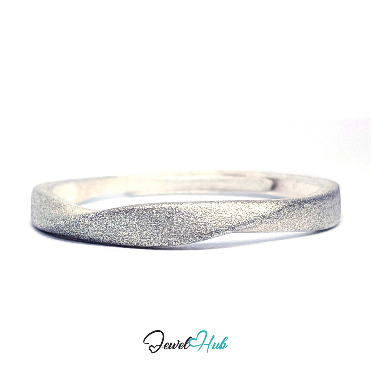 Mobius twist ring at an angle, showing the flat band turning over - JewelHub