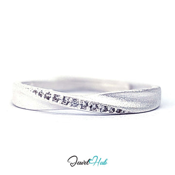 999 fine silver Mobius twist ring set with eleven small zirconia - JewelHub