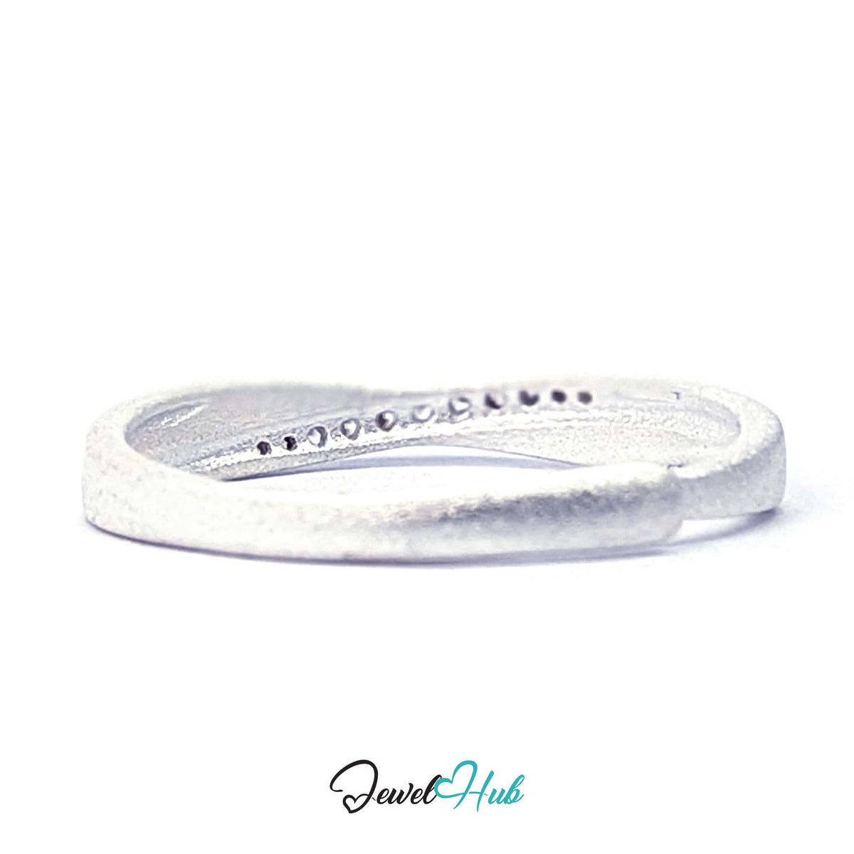 Stone-set Mobius band from above, showing the stones round the shoulder - JewelHub