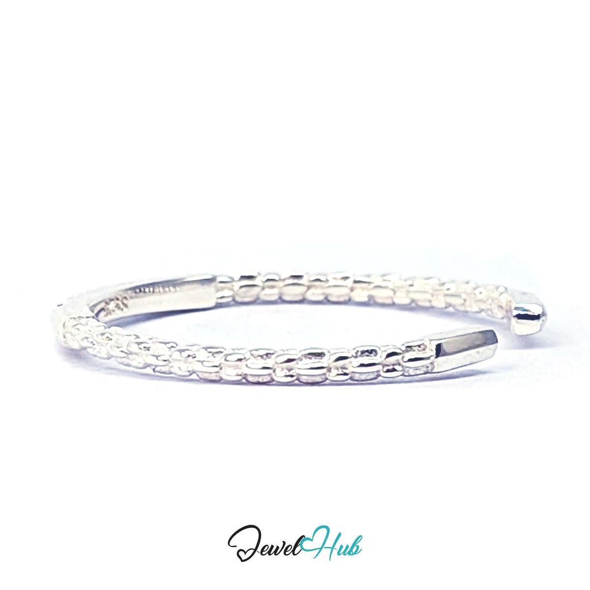 Side view of the two rows of fine beading that flank the stone-set bar - JewelHub