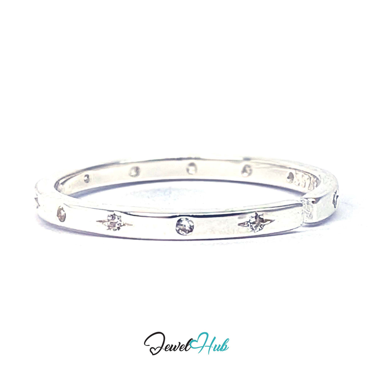 Starburst ring at an angle, alternating star and circle settings - JewelHub
