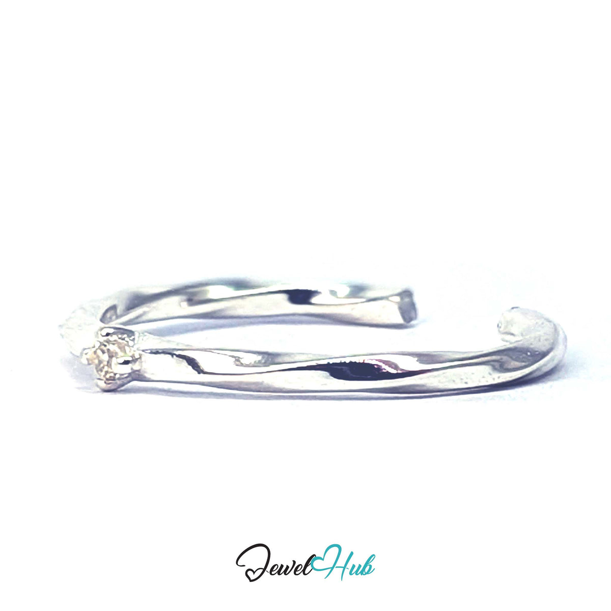 Twist ring at an angle, showing the band turning along its whole length - JewelHub