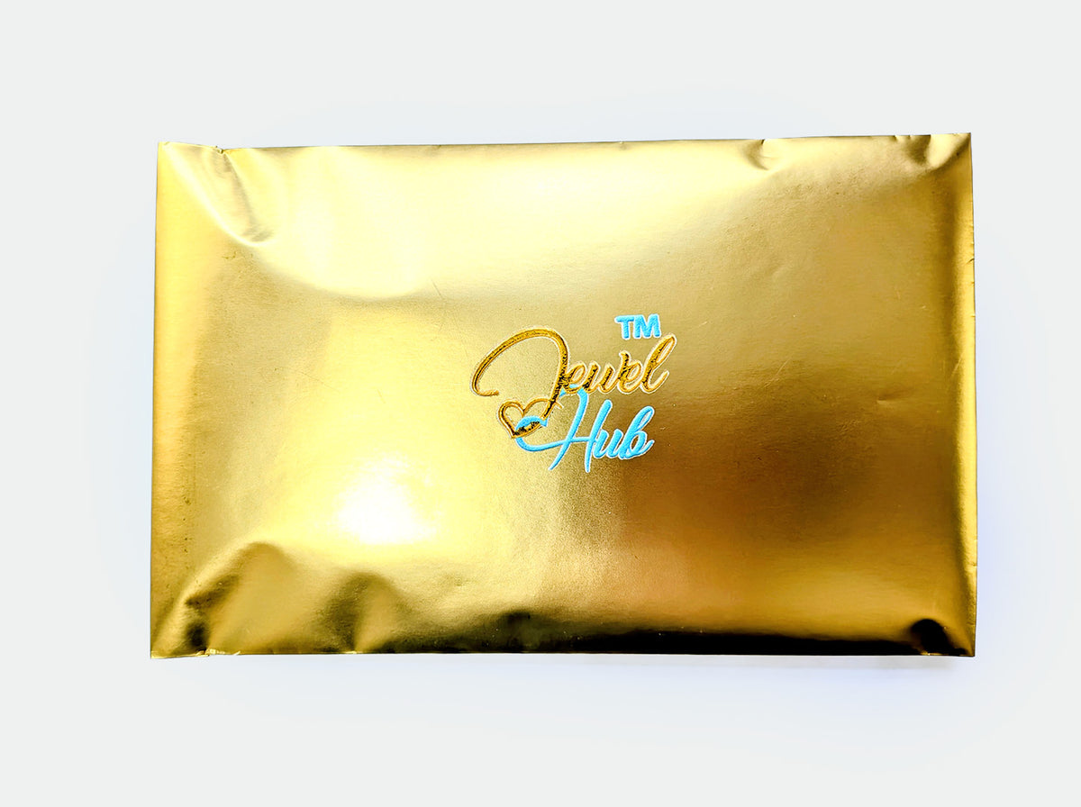 Gold foil wrapped JewelHub Event Gift Bag, ready to give at a charity event