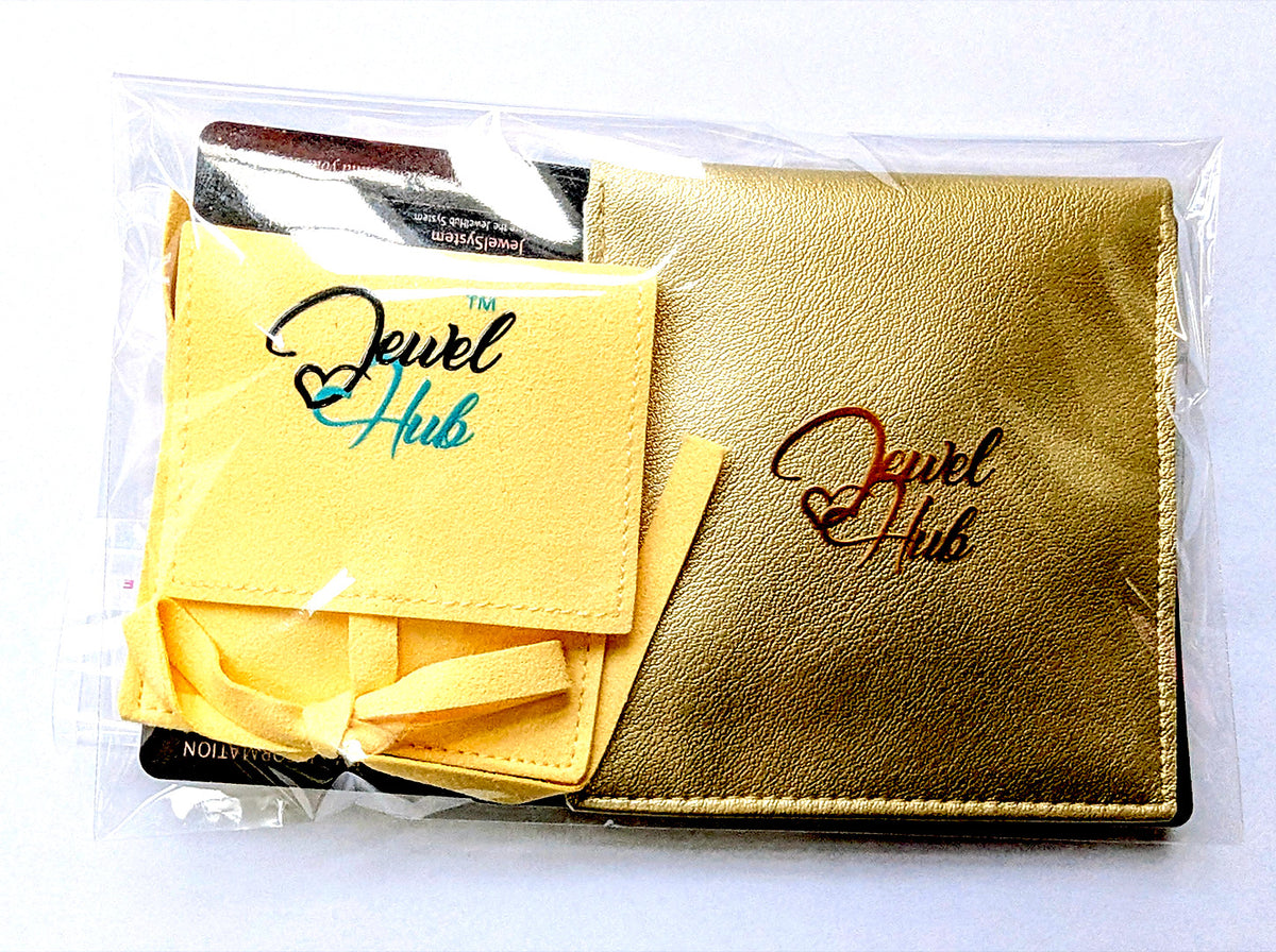 JewelHub Event Gift Bag in a clear zip bag with a gold pouch and a cream jewellery pouch