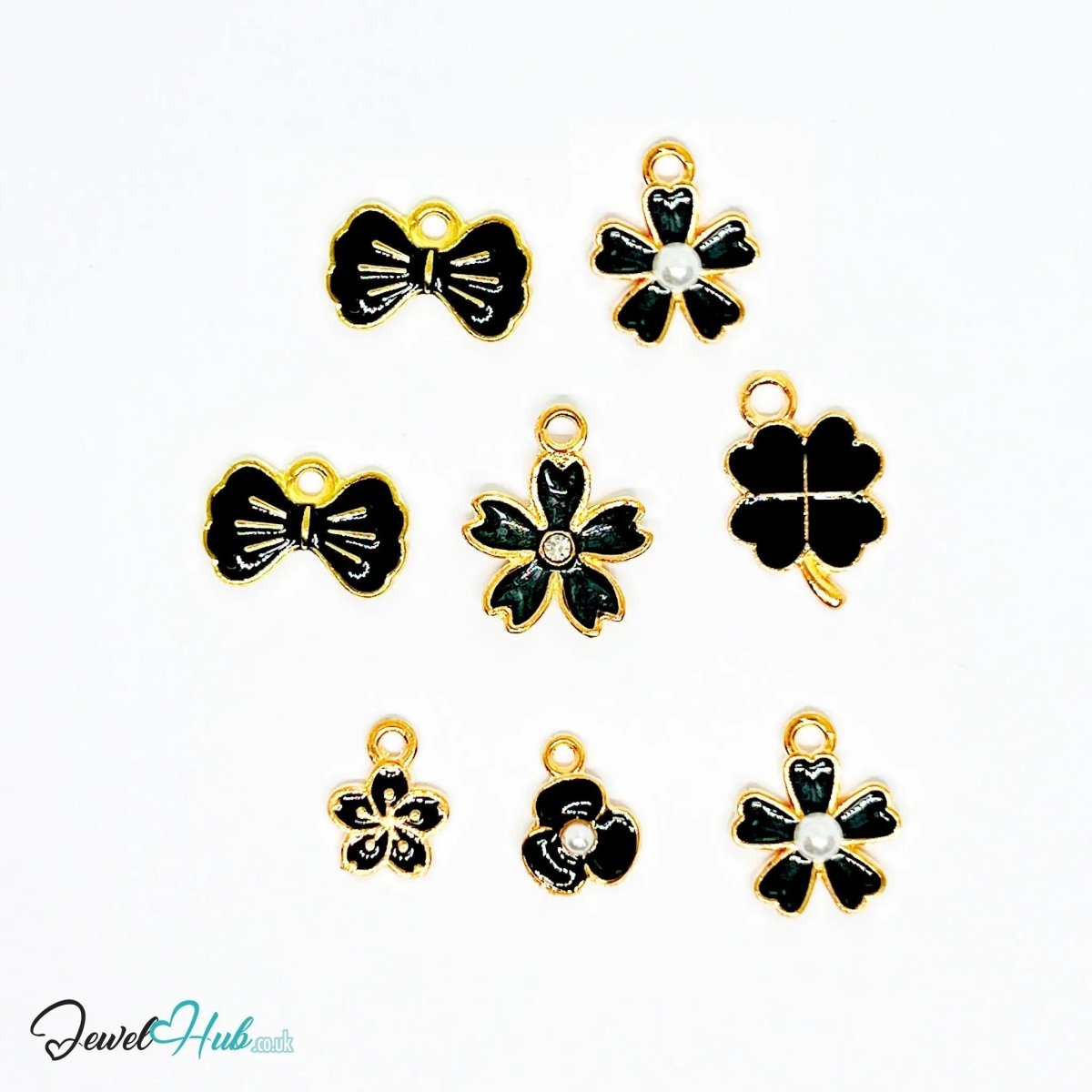 Bloom & Grace Charm Bracelet · Gold - Tone Plated · Glossy Black Floral Motifs · 19cm - JewelHub.co.uk