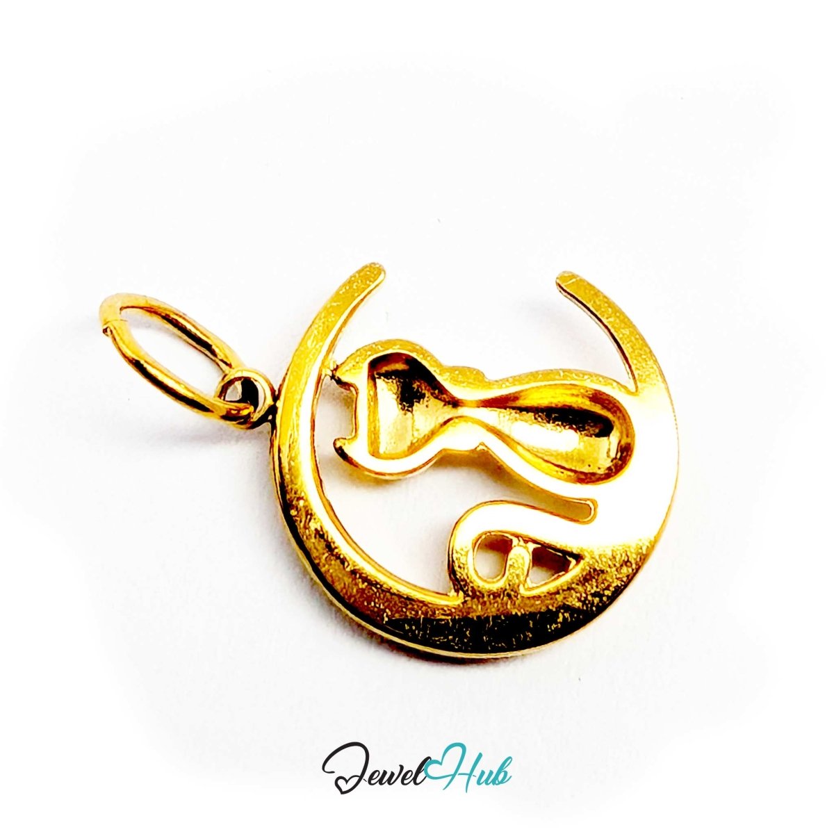Gold cat and moon charm tilted to show the polished edge of the crescent - JewelHub