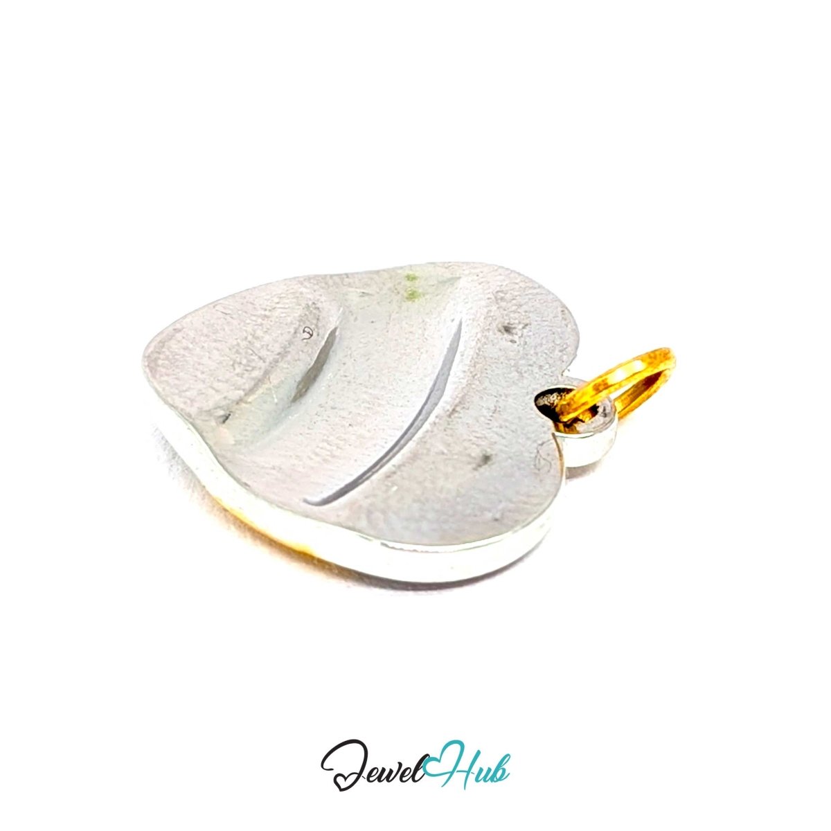 Curve Heart charm turned to its silver reverse, the sweep showing as a raised fold - JewelHub