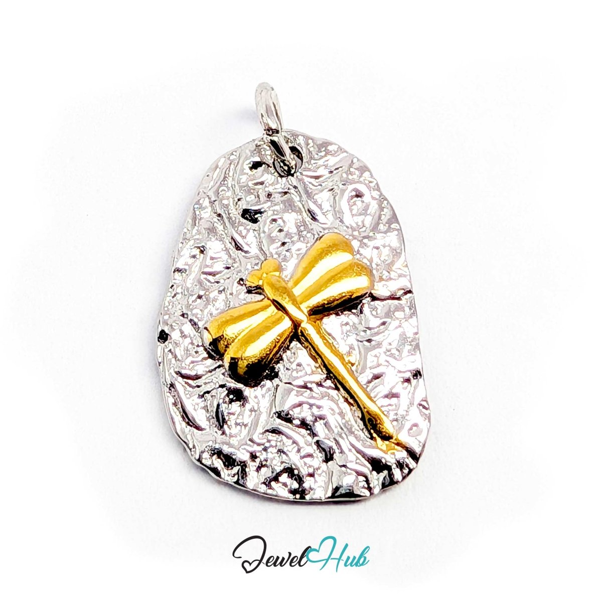 Dragonfly charm tilted forward to show the depth of the gold body against the silver plate - JewelHub