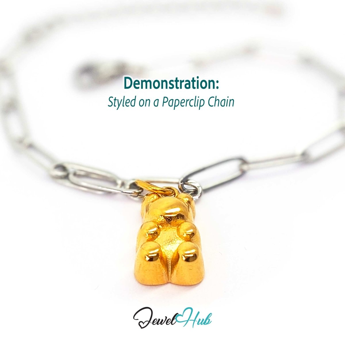 Gold classic Gummy Bear charm styled on a silver paperclip chain bracelet for a two-tone look - JewelHub
